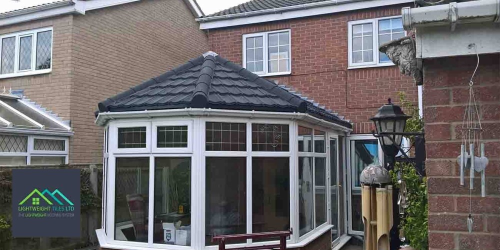 25 Victorian conservatory with grey lightweight roofing tiles