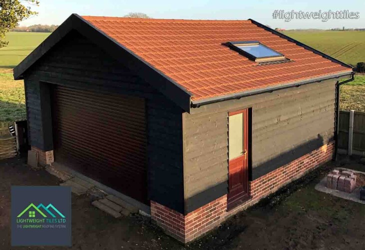 Large Brown plastic garage roof replacement by lightweight tiles