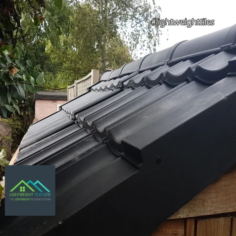 Close up image of black shed roof replacement tiles by Lightweight Tiles