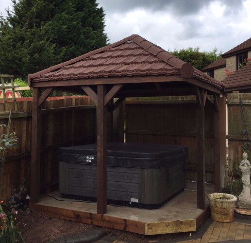 Brown Gazebo with new fitted lightweight roof tiles