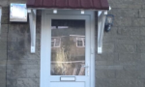 porch with new brown lightweight roof tiles