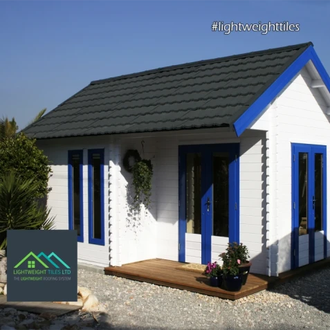 beach hut with grey lightweight roof tiles WEB v2
