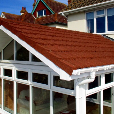 gabled conservatory roof conversion with red tiles