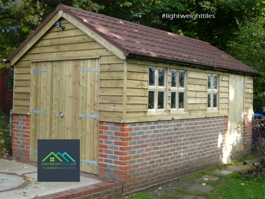 Wooden garage roof replacement in Brown plastic tiles by lightweight tiles