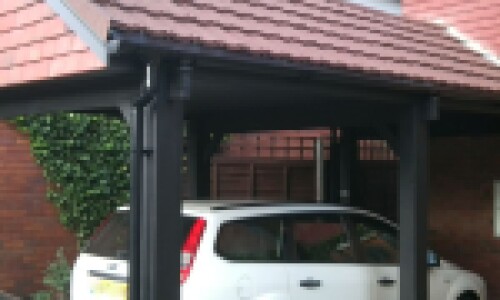 car port using brown recycled roof tiles
